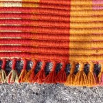 Whipped ends of warp-faced rugs